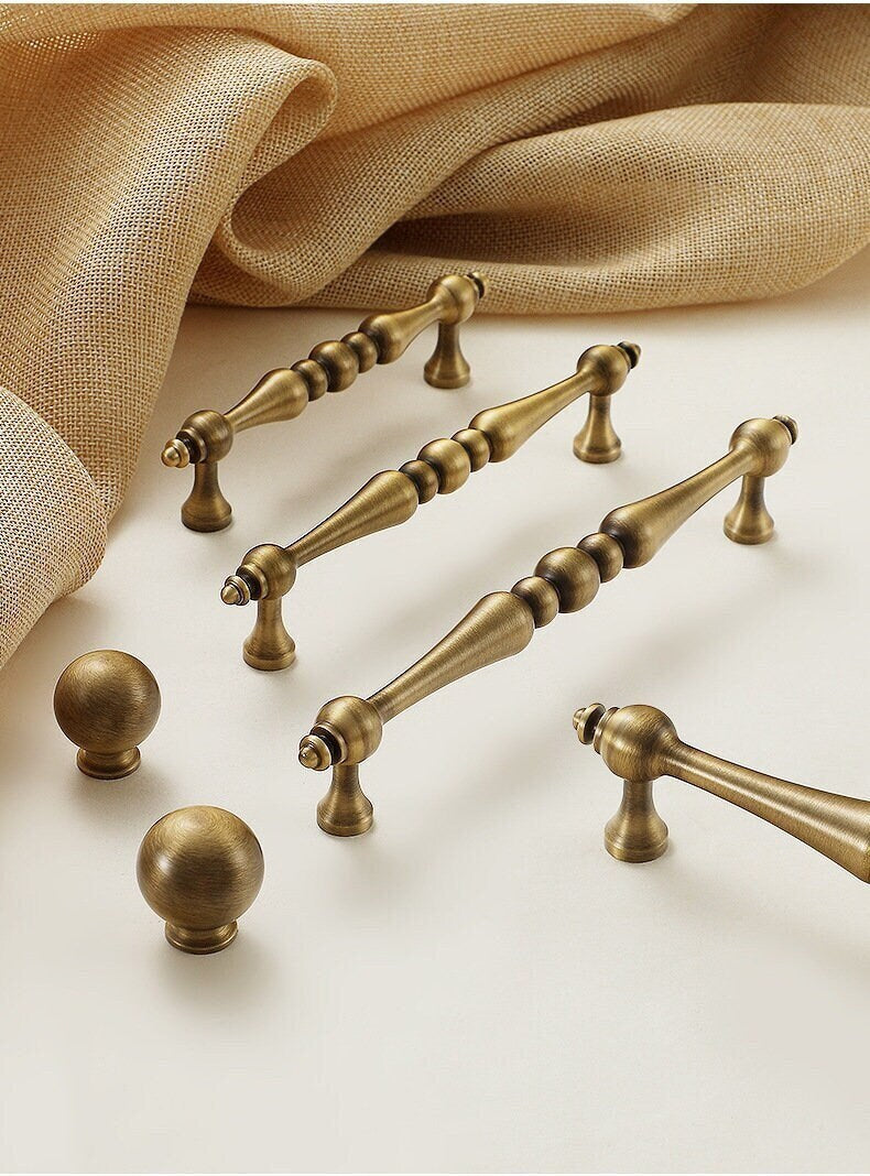 Antique brass Cabinet handle pull Elegant Dresser Knobs QubicHomeware Antique brass Cabinet handle pull Elegant Dresser Knobs QubicHomeware